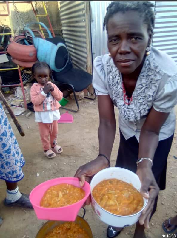 Warm community moment in Okahao