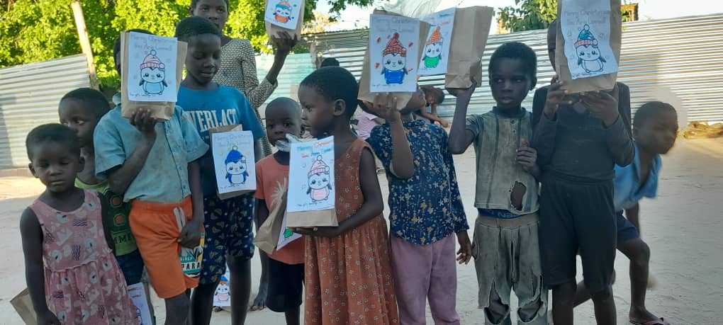Neighbors gather with warm smiles in Okahao
