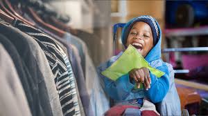 Volunteers sorting clothing for families